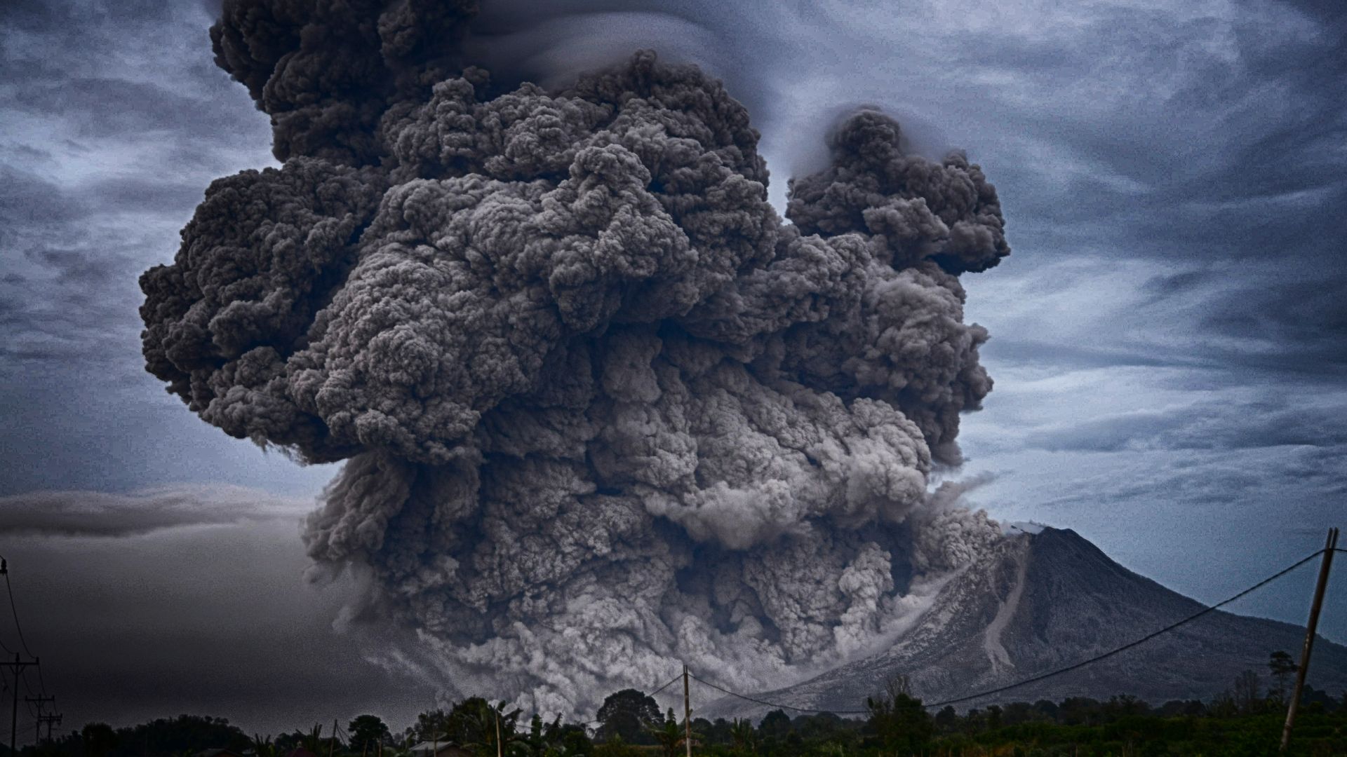 volcano eruption during daytime