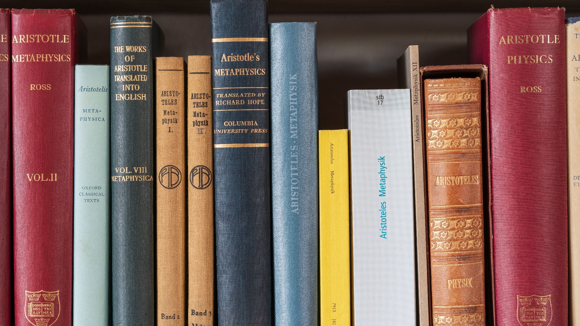 File:Part of a bookshelf containing books by Aristotle (1).jpg