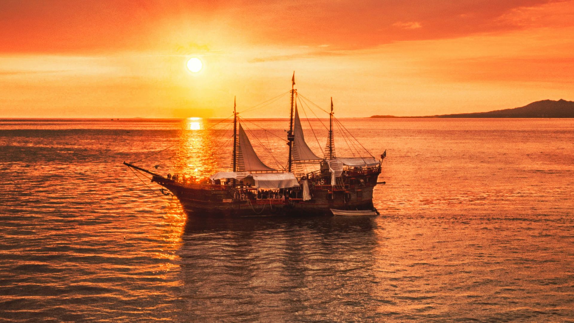 brown boat on calm water