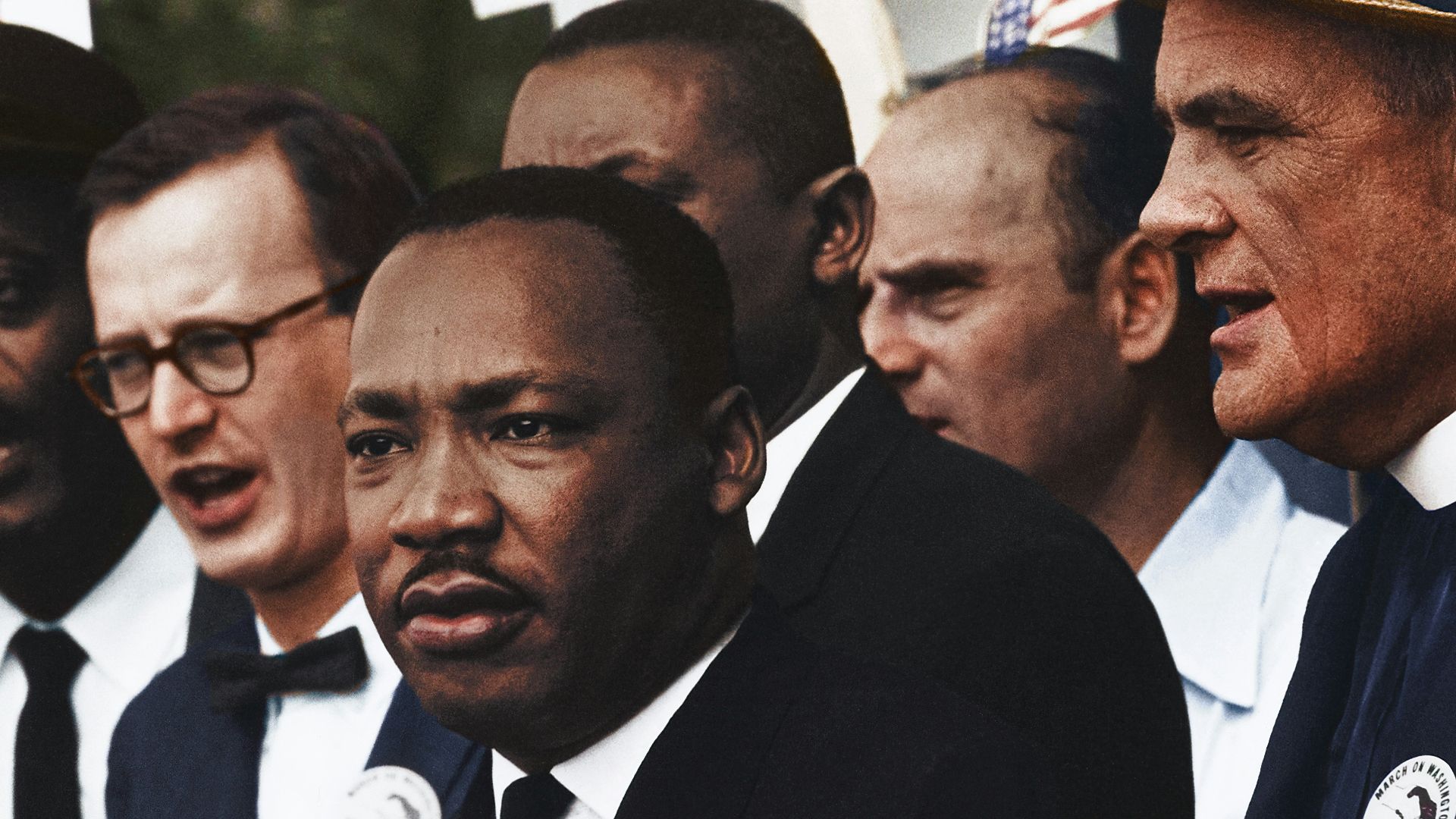 Dr. Martin Luther King, Jr. and Mathew Ahmann in a crowd of demonstrators at the March on Washington