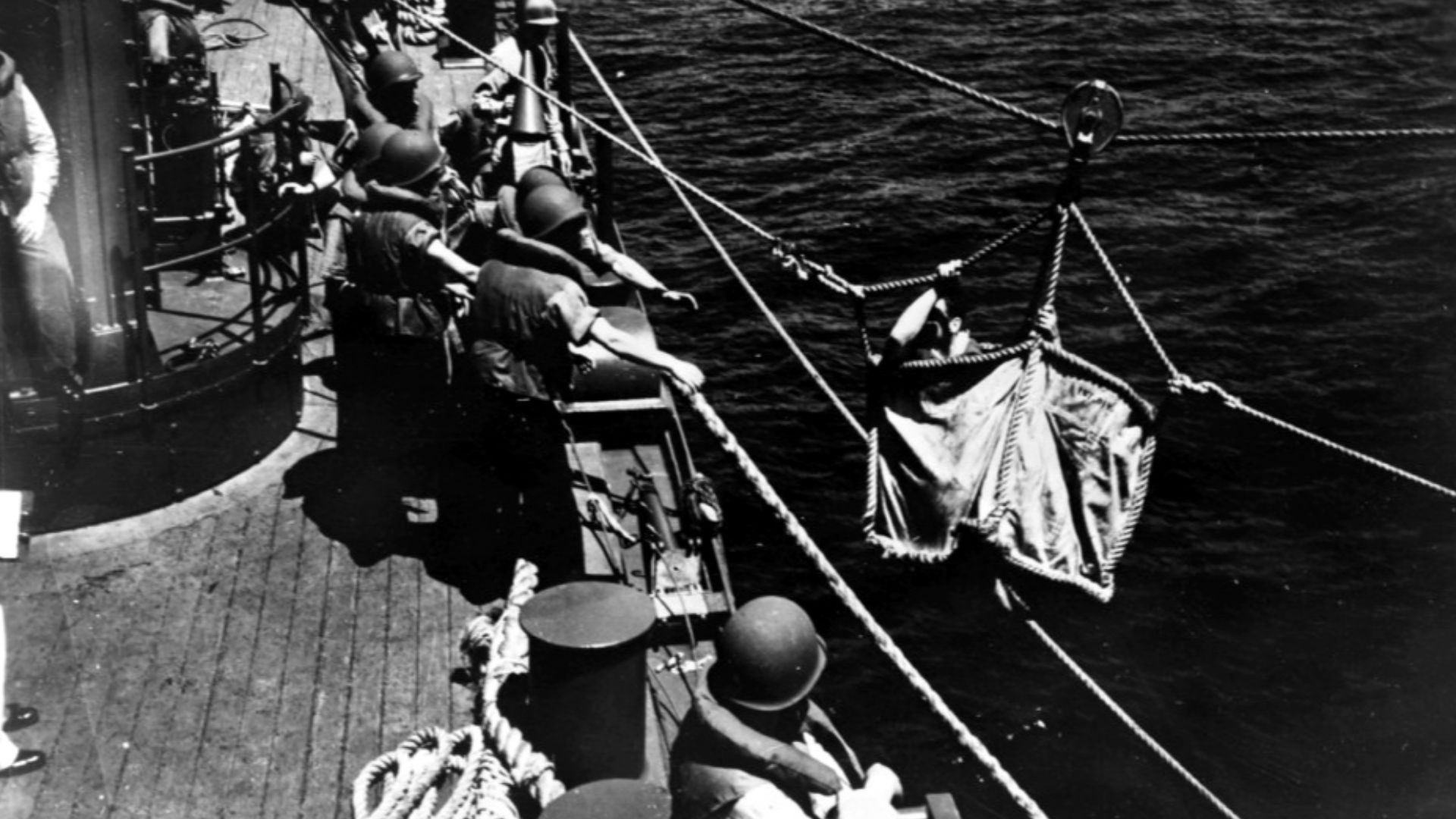 File:Wounded seaman transferred to ship during Battle of Midway 1942.jpg