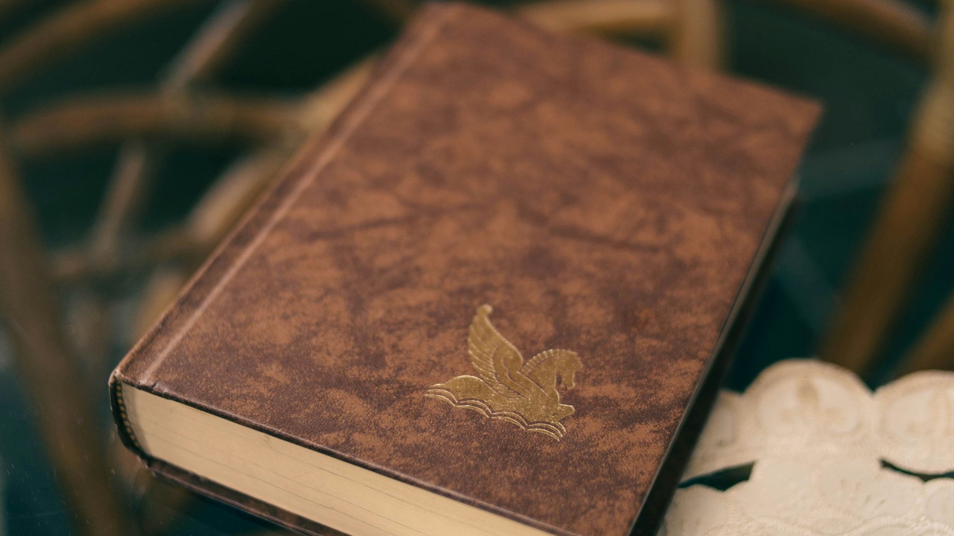 a brown book sitting on top of a table