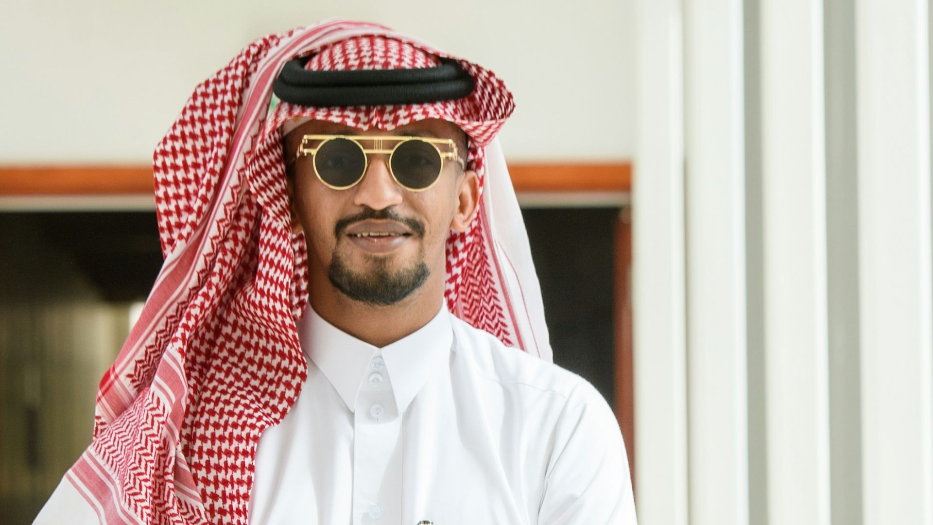 man in white thobe standing