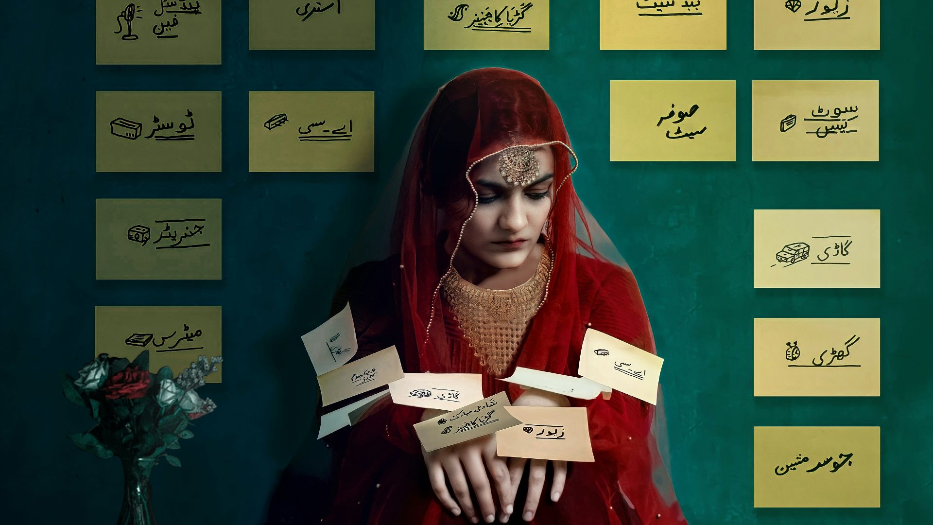 woman in red and black coat holding white and red cards