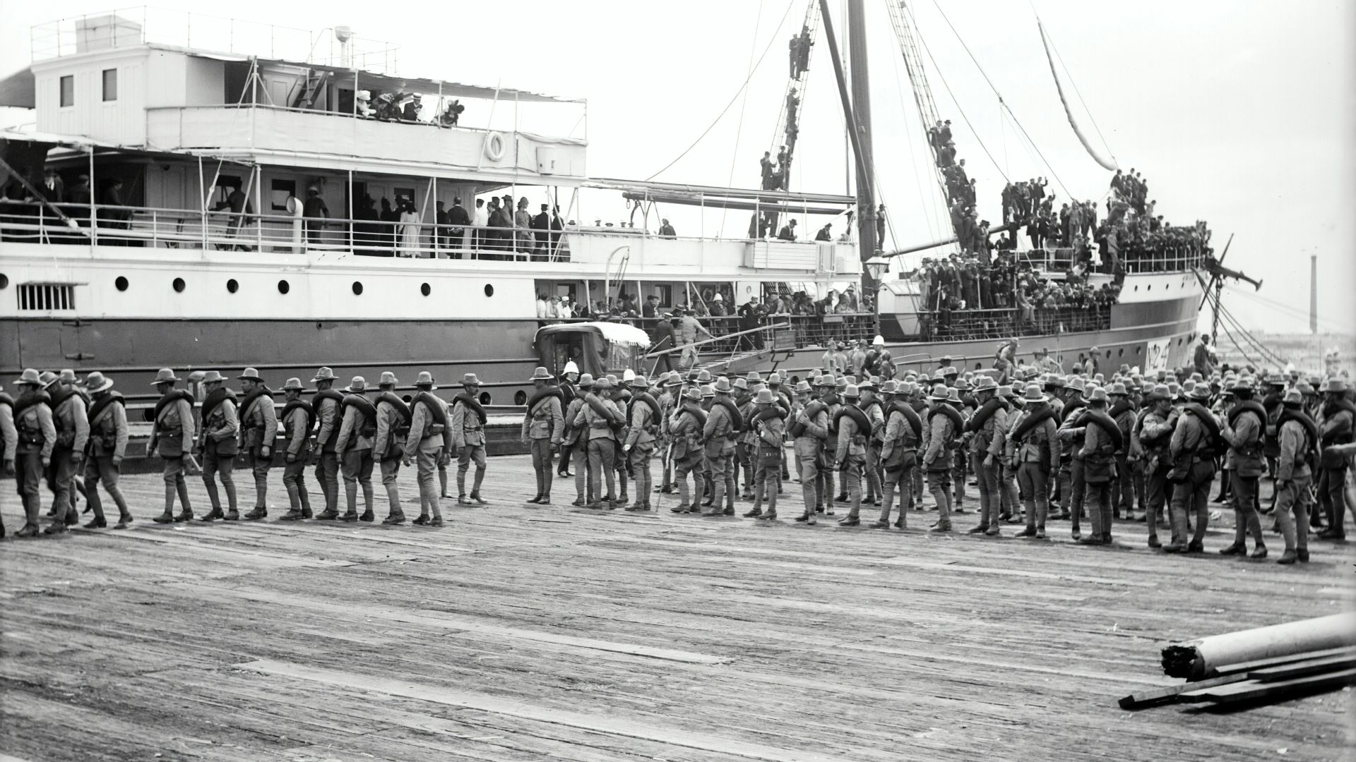group of boy's standing near on ship