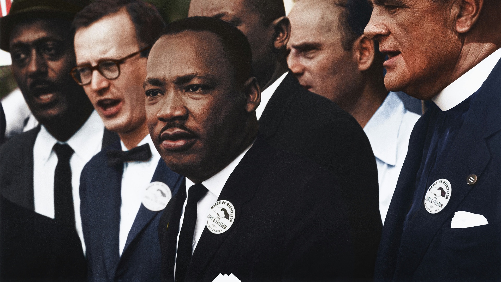 Dr. Martin Luther King, Jr. and Mathew Ahmann in a crowd of demonstrators at the March on Washington