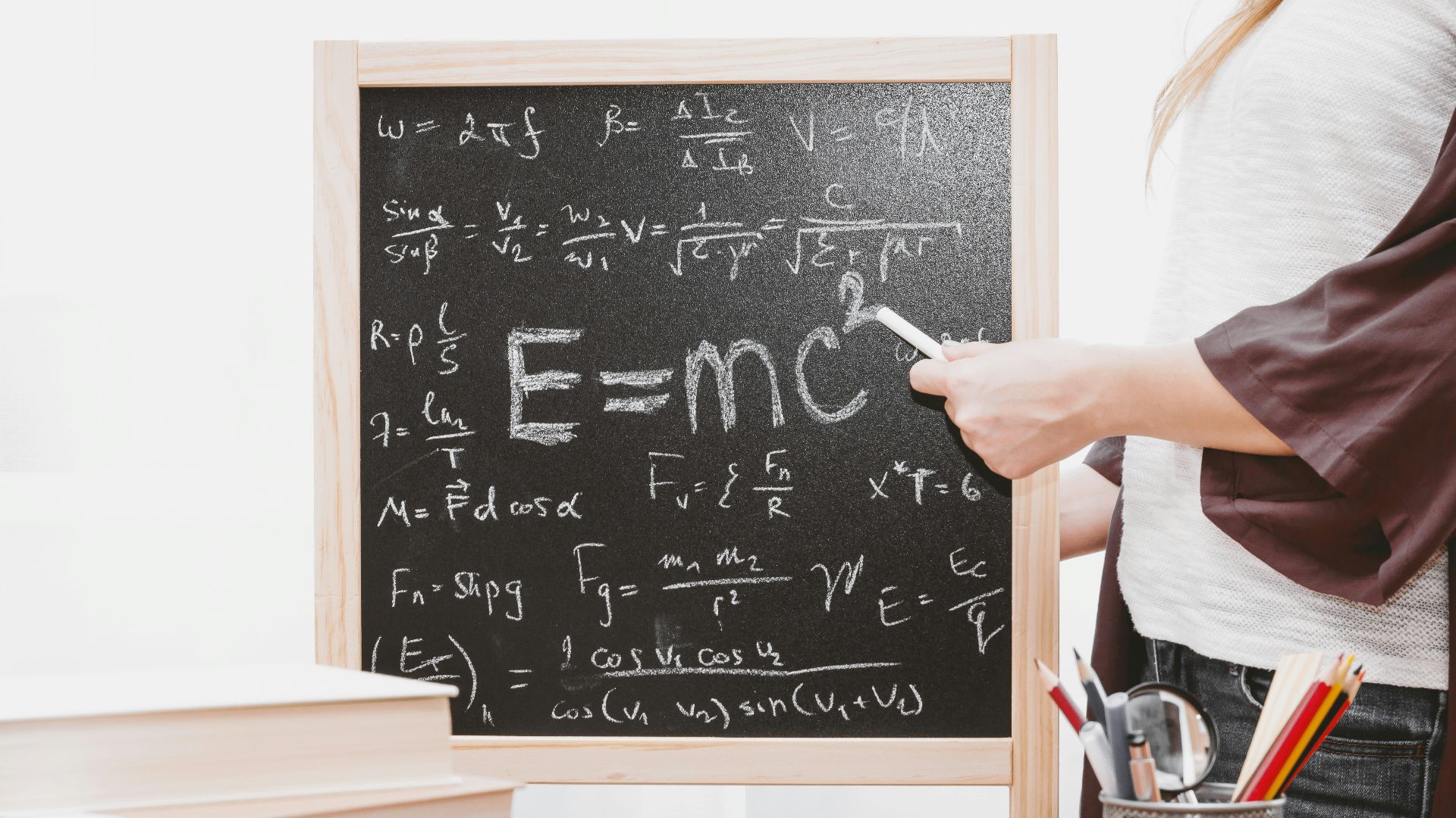 E-mc2 written on chalkboard