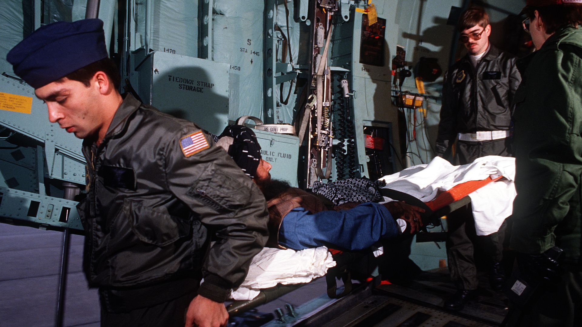 File:Medics from the 2nd Aeromedical Evacuation Squadron remove wounded Afghan freedom fighters from a C-141B Starlifter aircraft DF-ST-89-01809.jpg