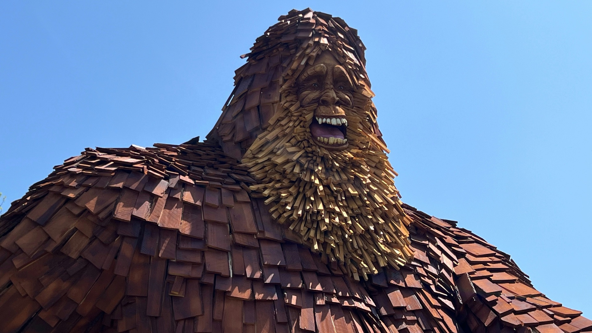 a large statue of a man with a beard