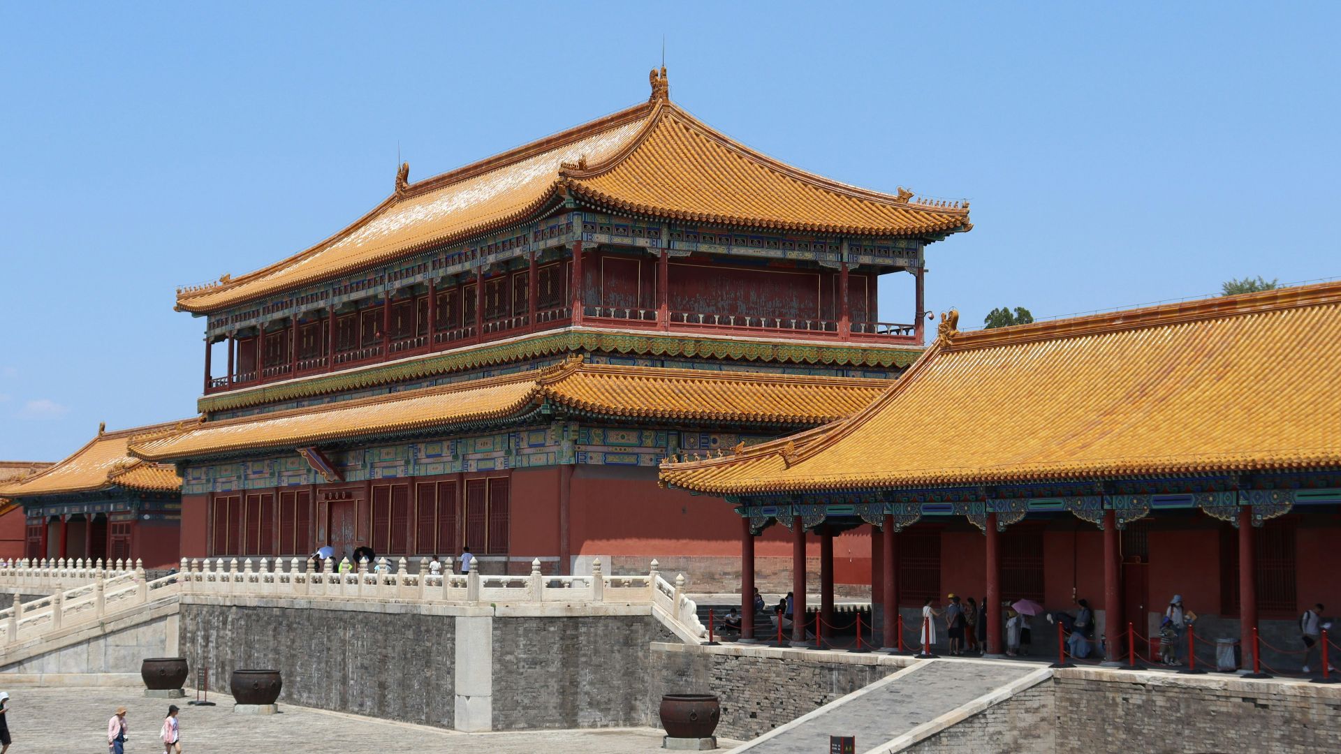 a group of people standing in front of a building