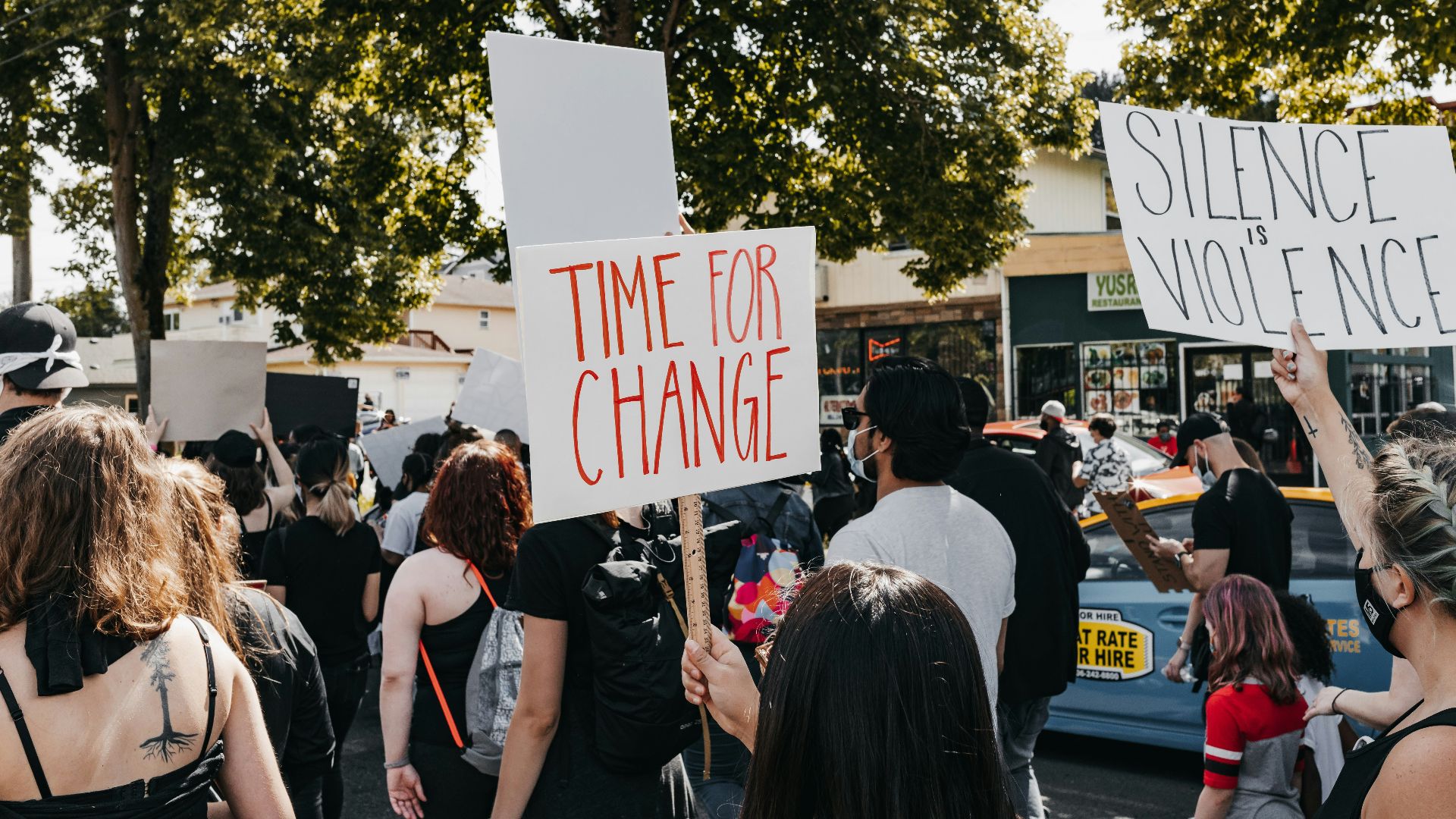 people standing on street during daytime