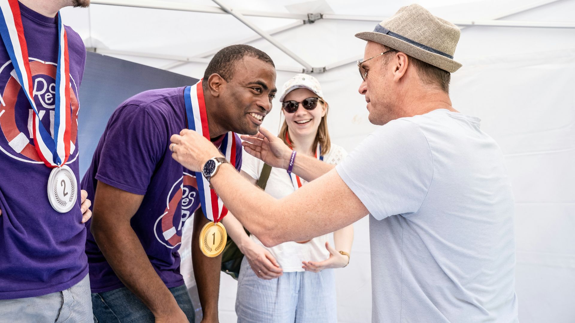 A group of men standing next to each other