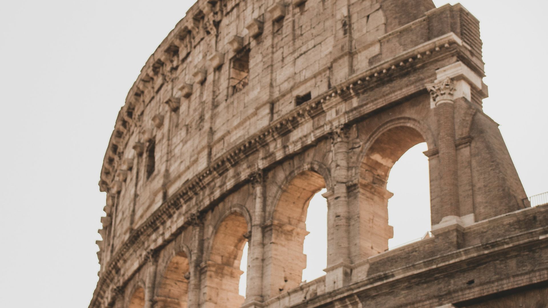 brown concrete building under white sky during daytime