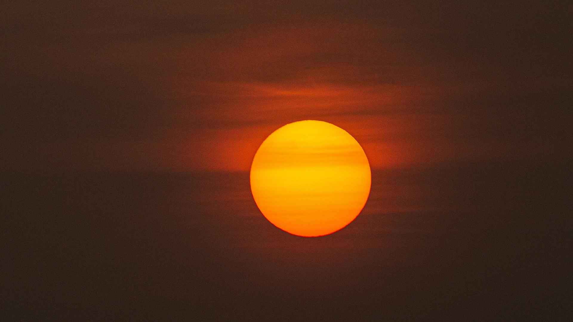 low-light photo of sun