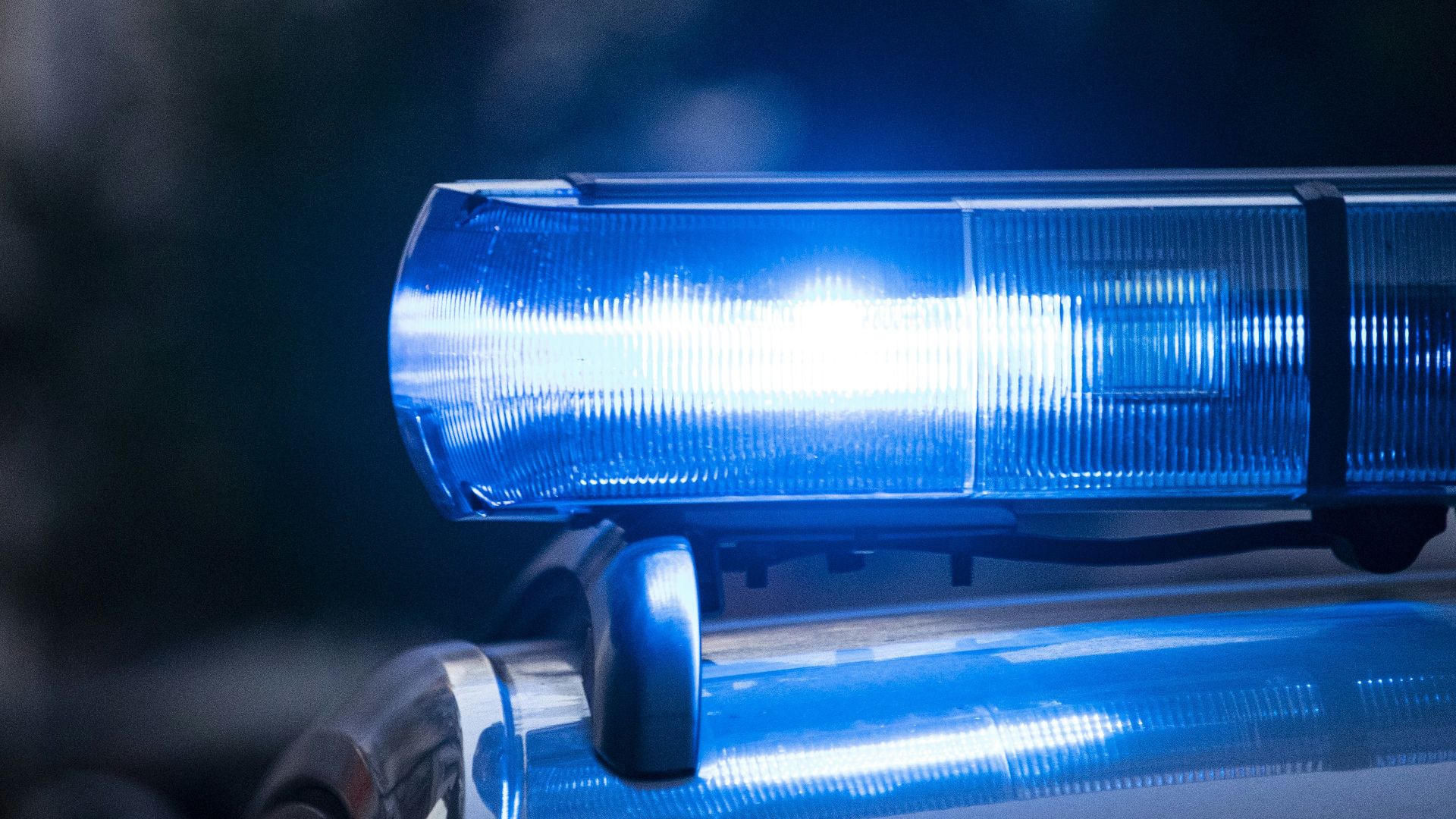 a close up of a police car with its lights on