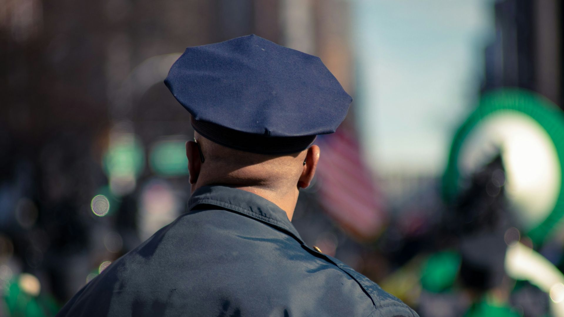man wearing police uniform selective focus photo
