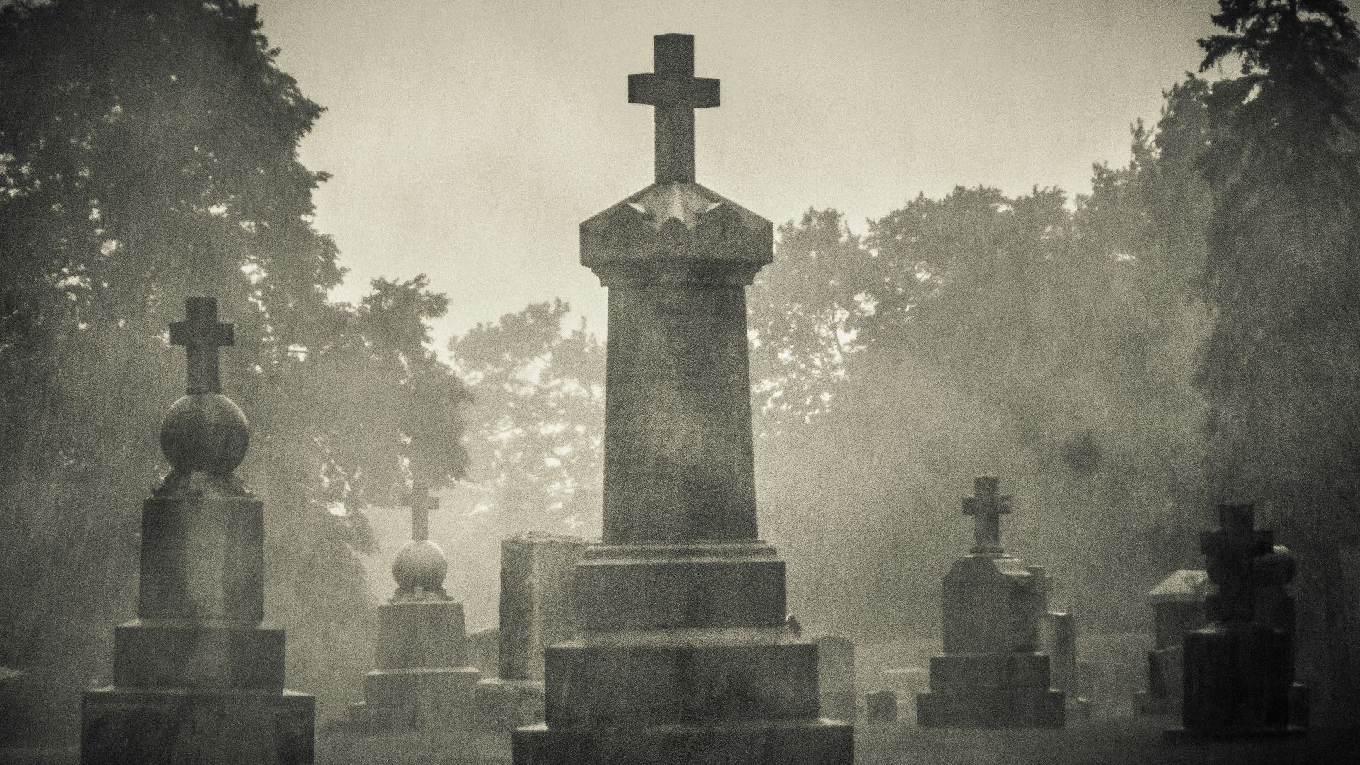 gray concrete cross on gray concrete blocks