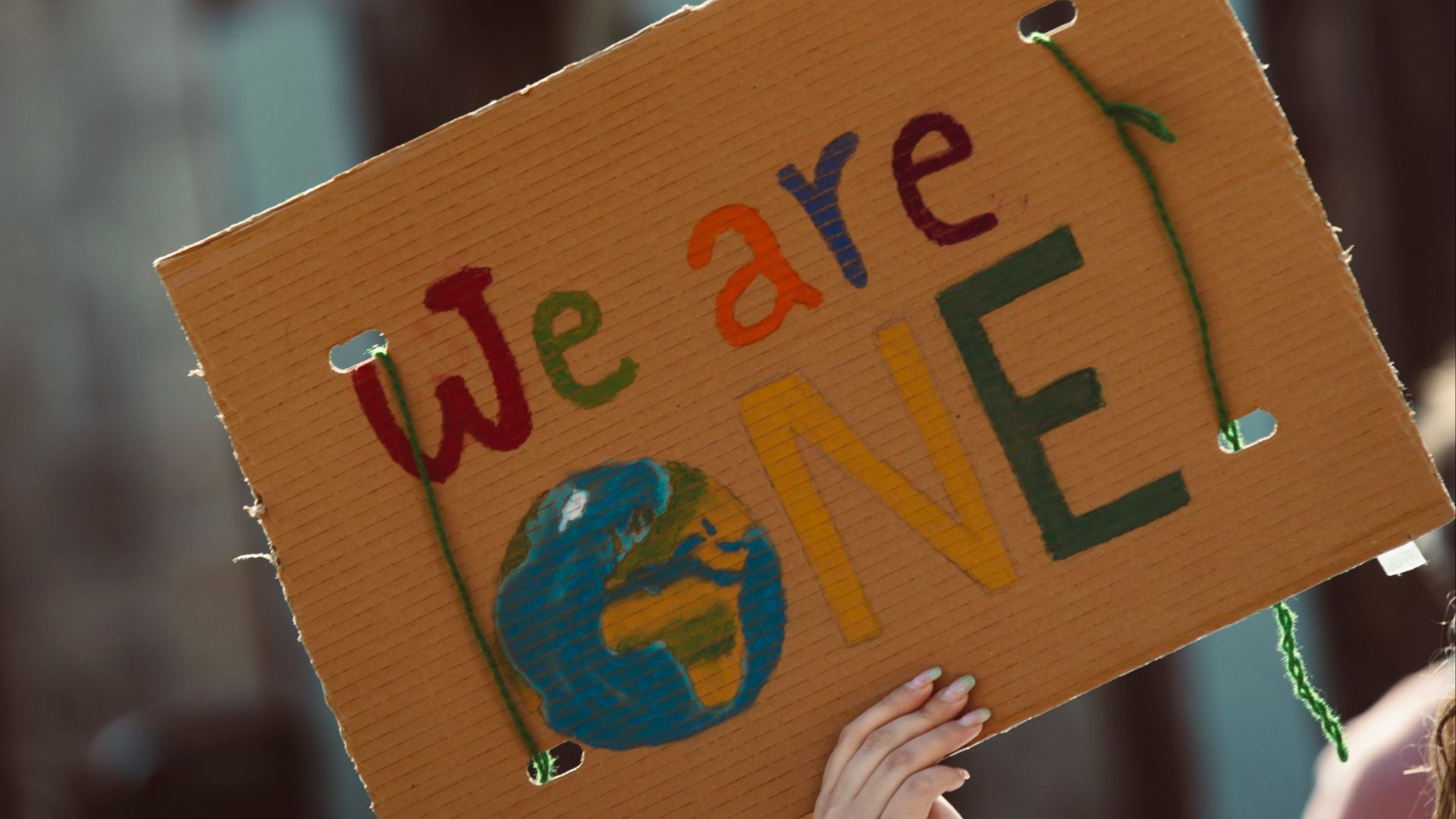 a person holding a sign