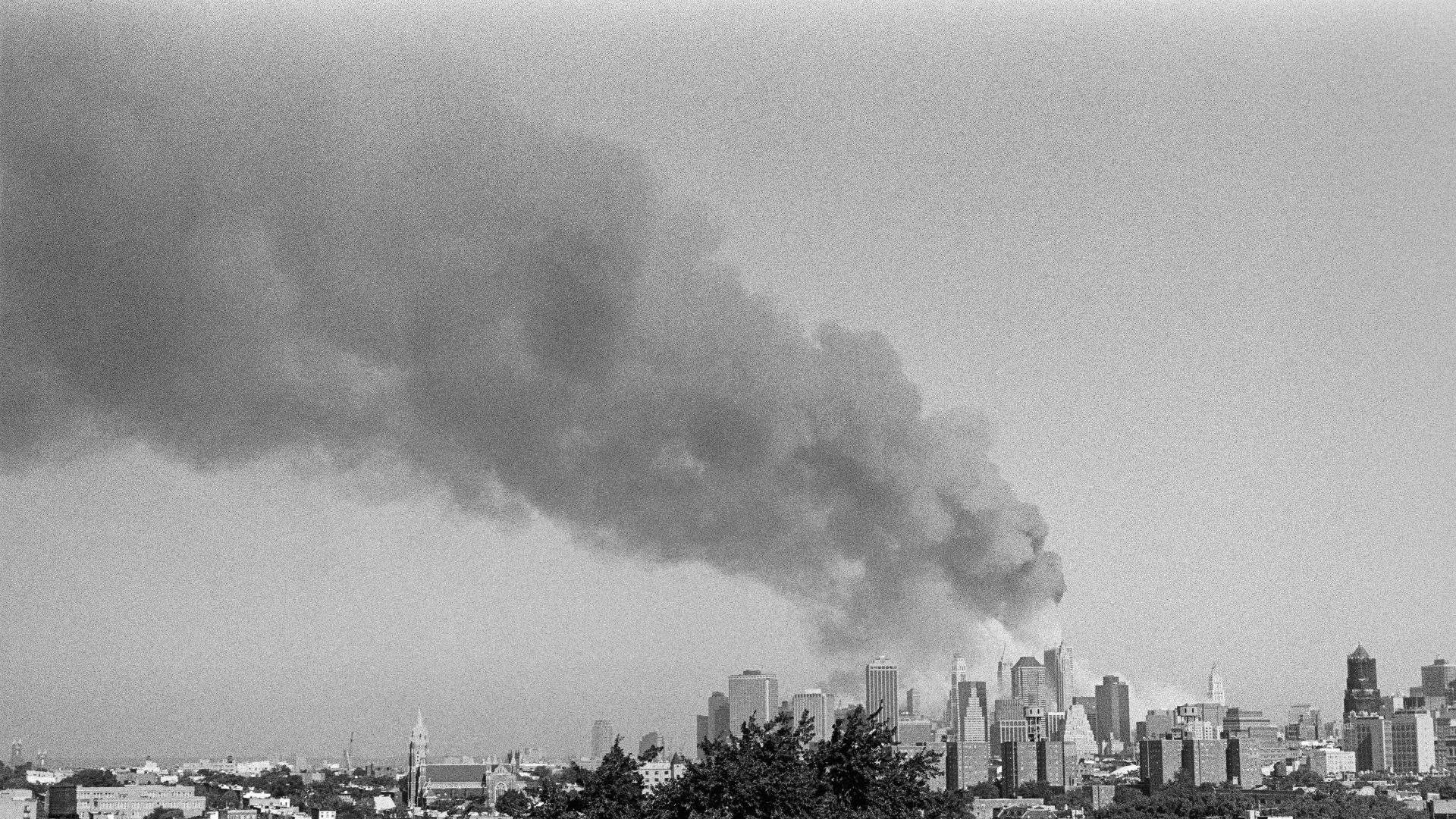 a black and white photo of a city skyline