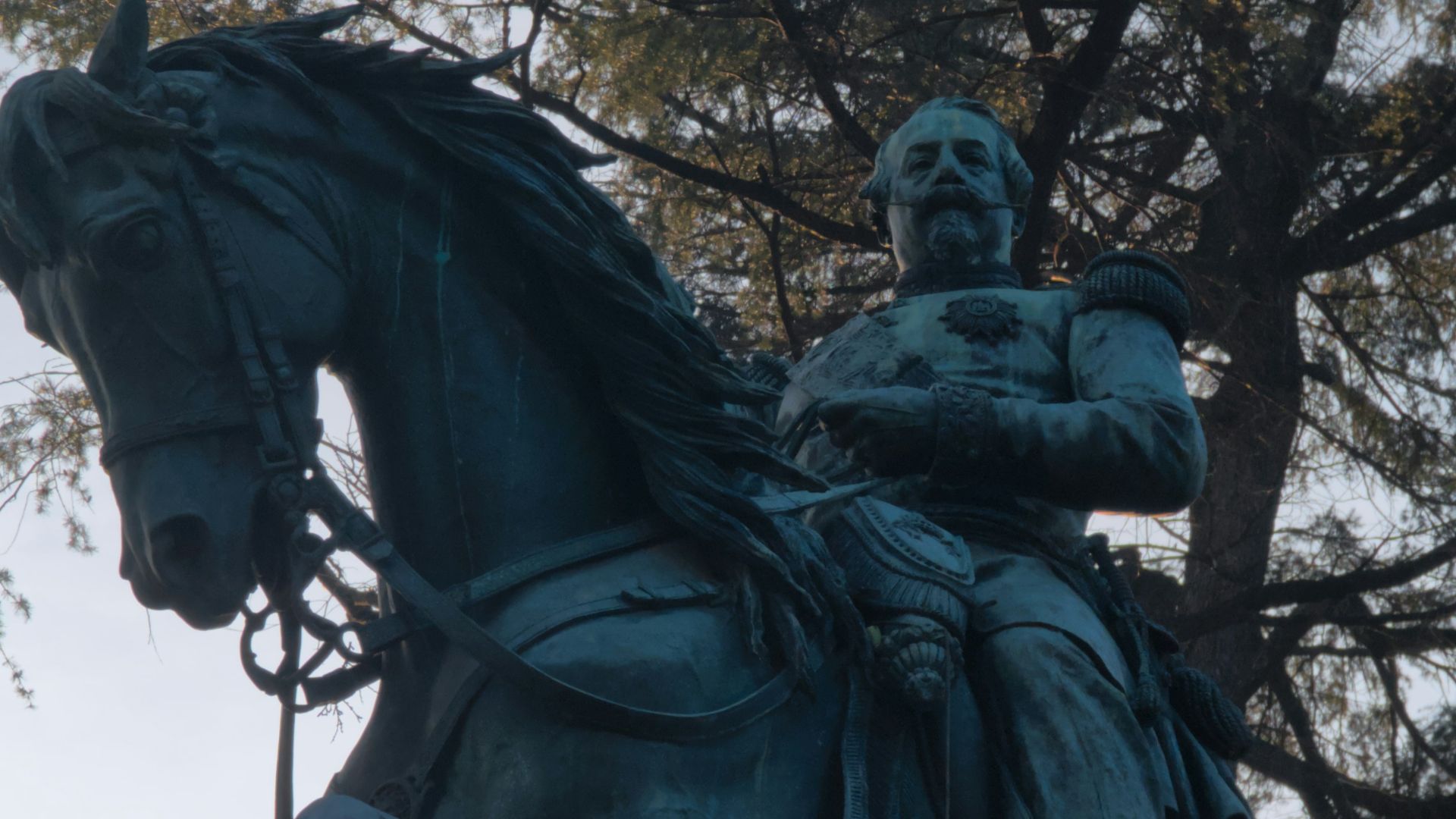 a statue of a man riding on the back of a horse