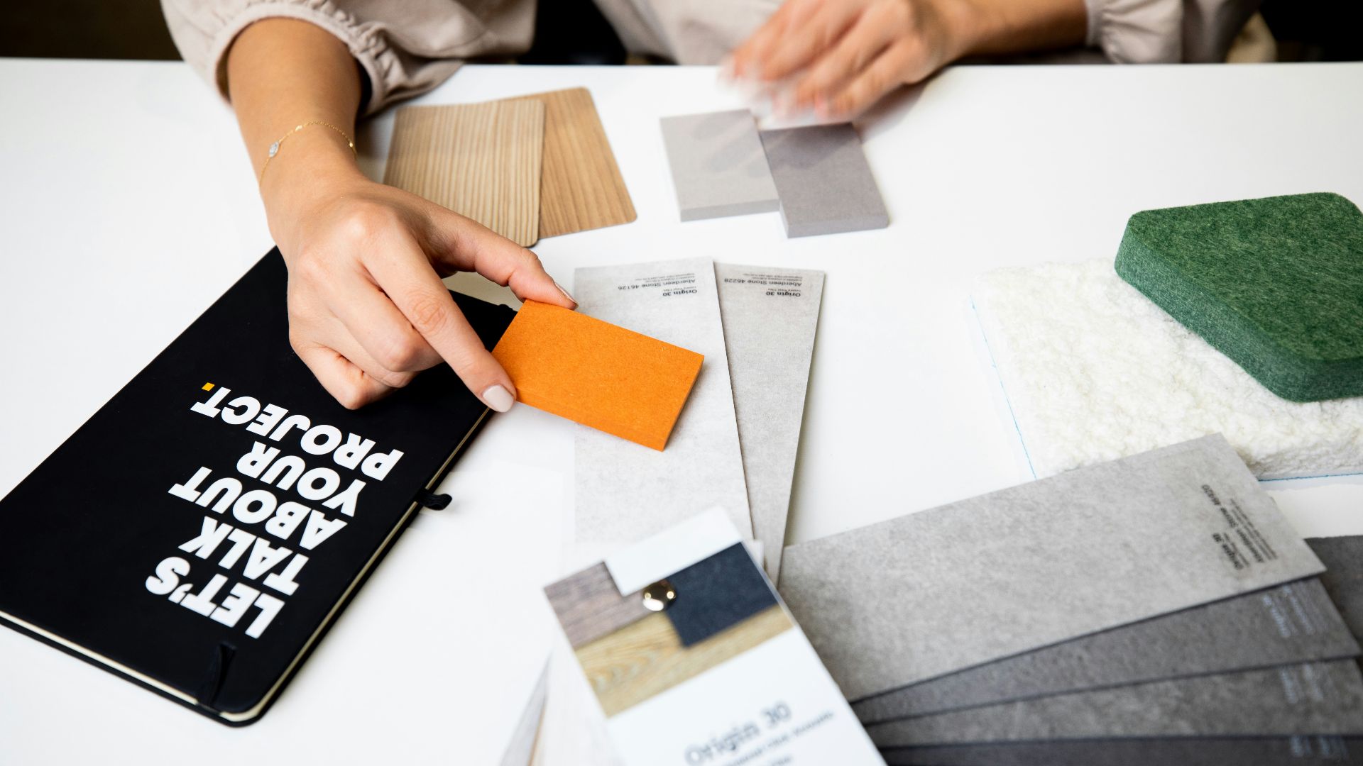 a person writing on paper