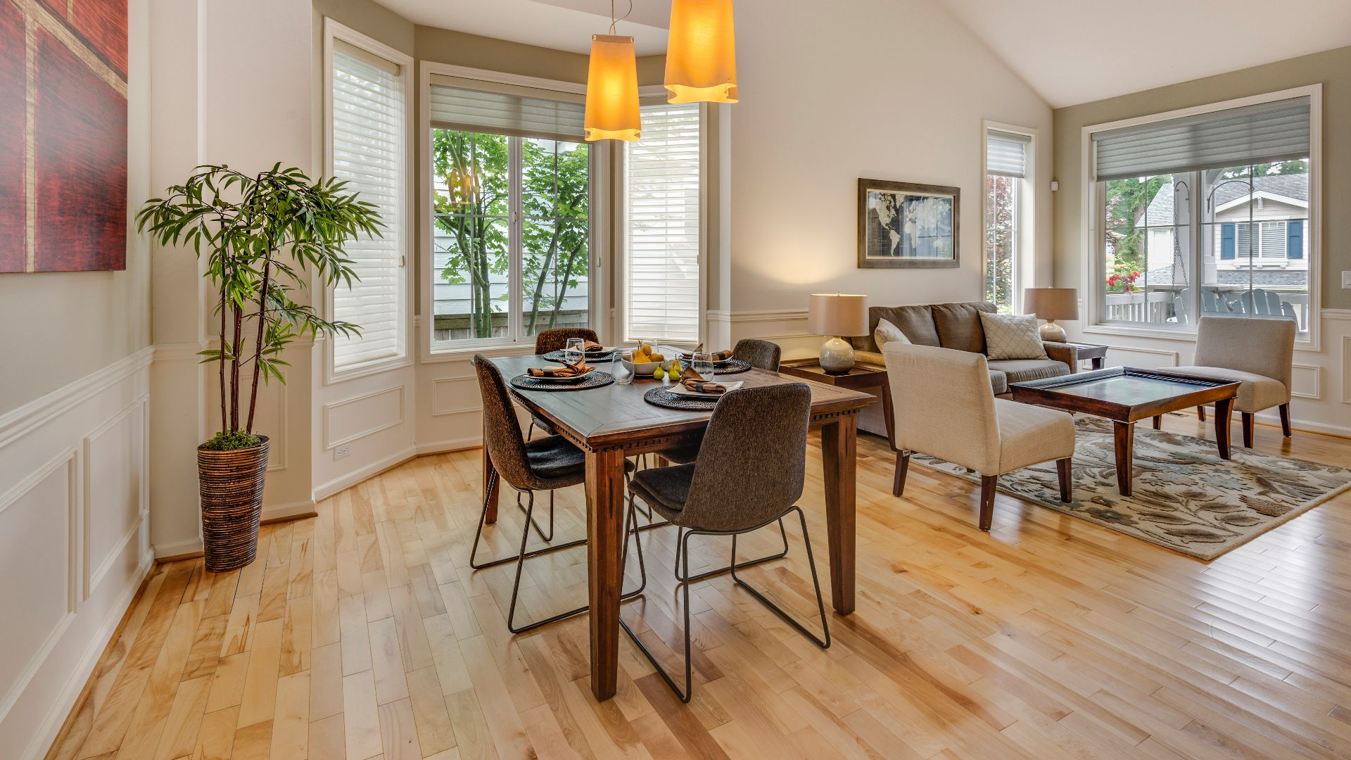 brown-and-black wooden 5-piece dining set