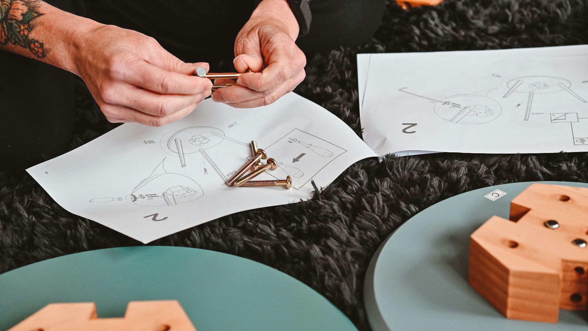 a person drawing on paper