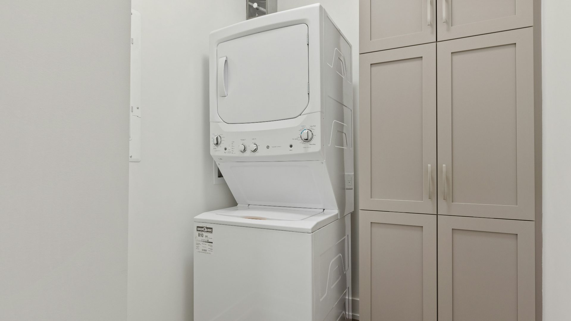 a washer and dryer in a small room