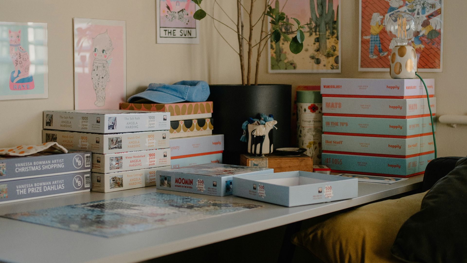 Desk with puzzles and colorful wall art