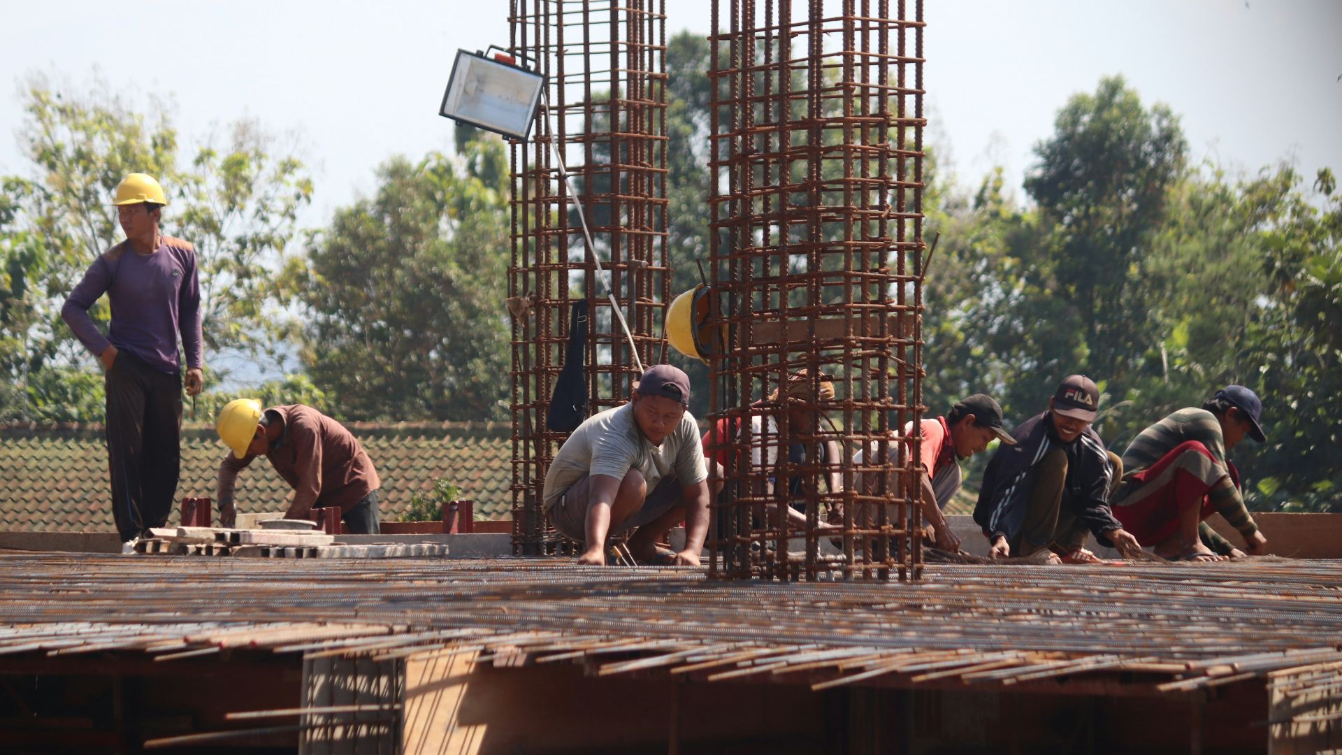 people standing on brown wooden bridge during daytime