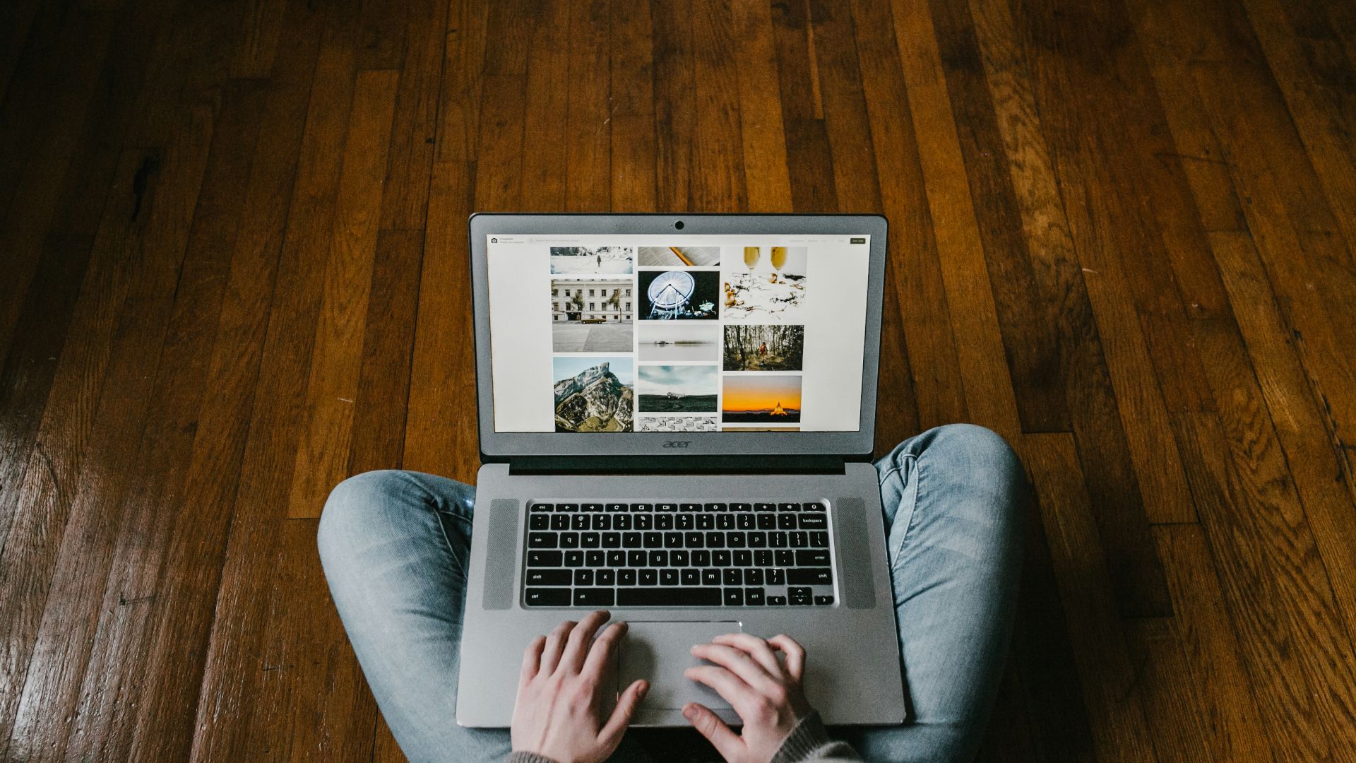 person using laptop on lap