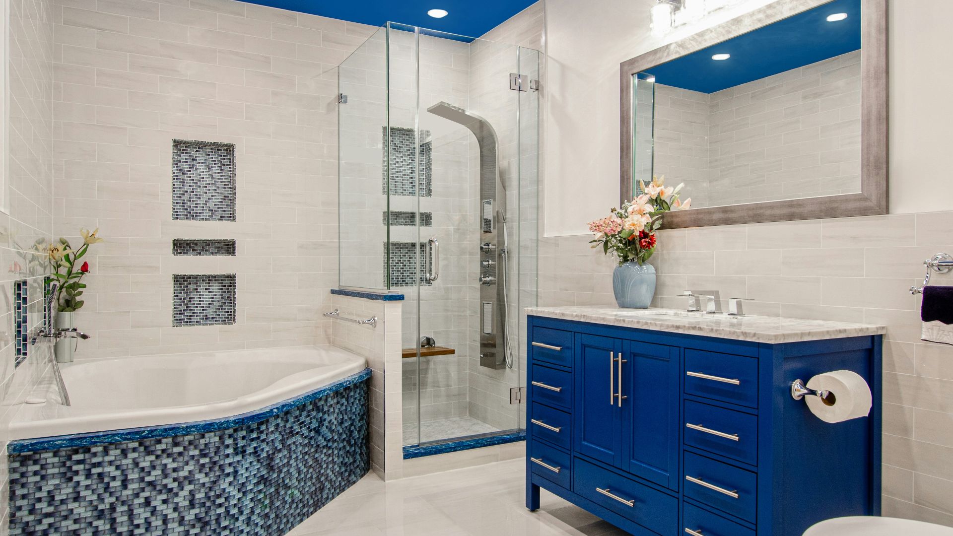 blue wooden cabinet near white wall