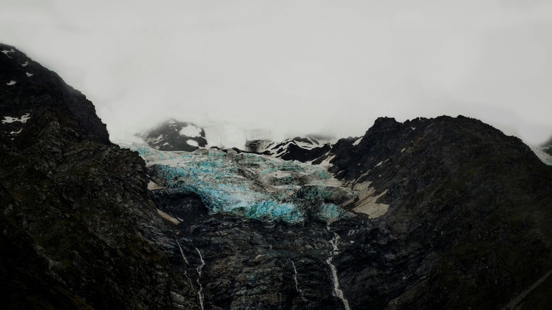 black mountain with snow during daytime