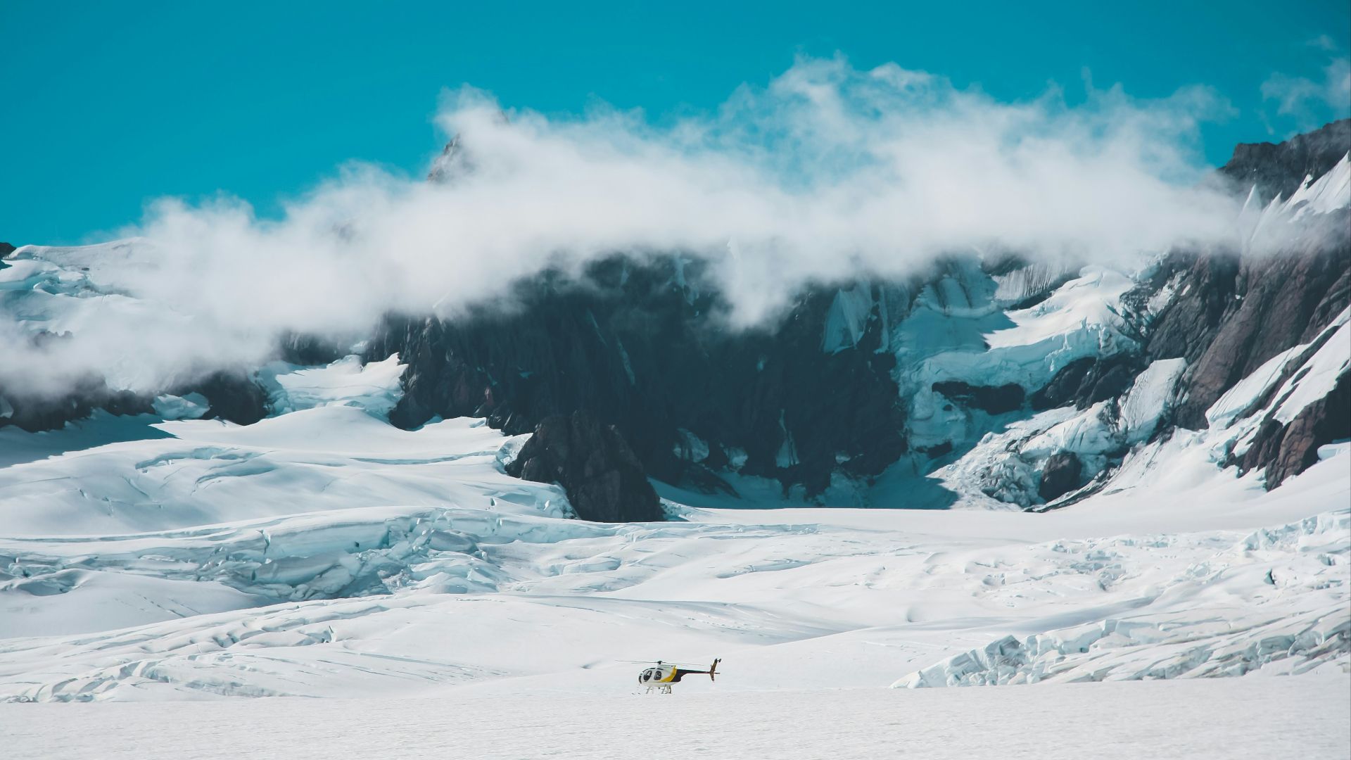 snow mountain under blue sky