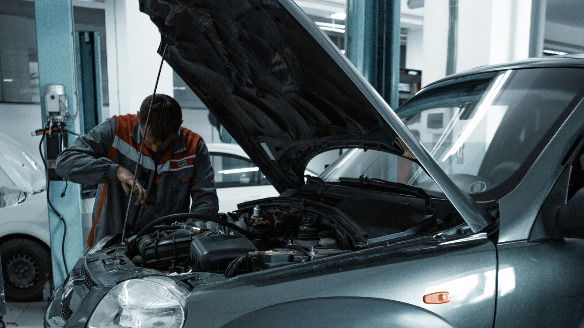 black suv in a garage