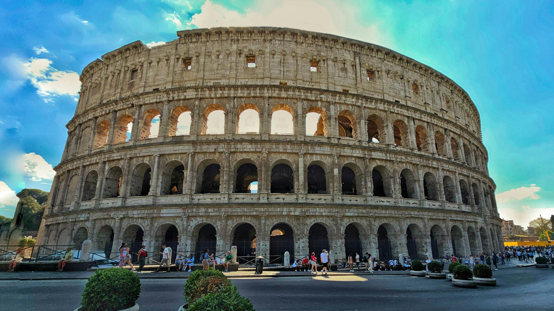 A very large building with a sky in the background