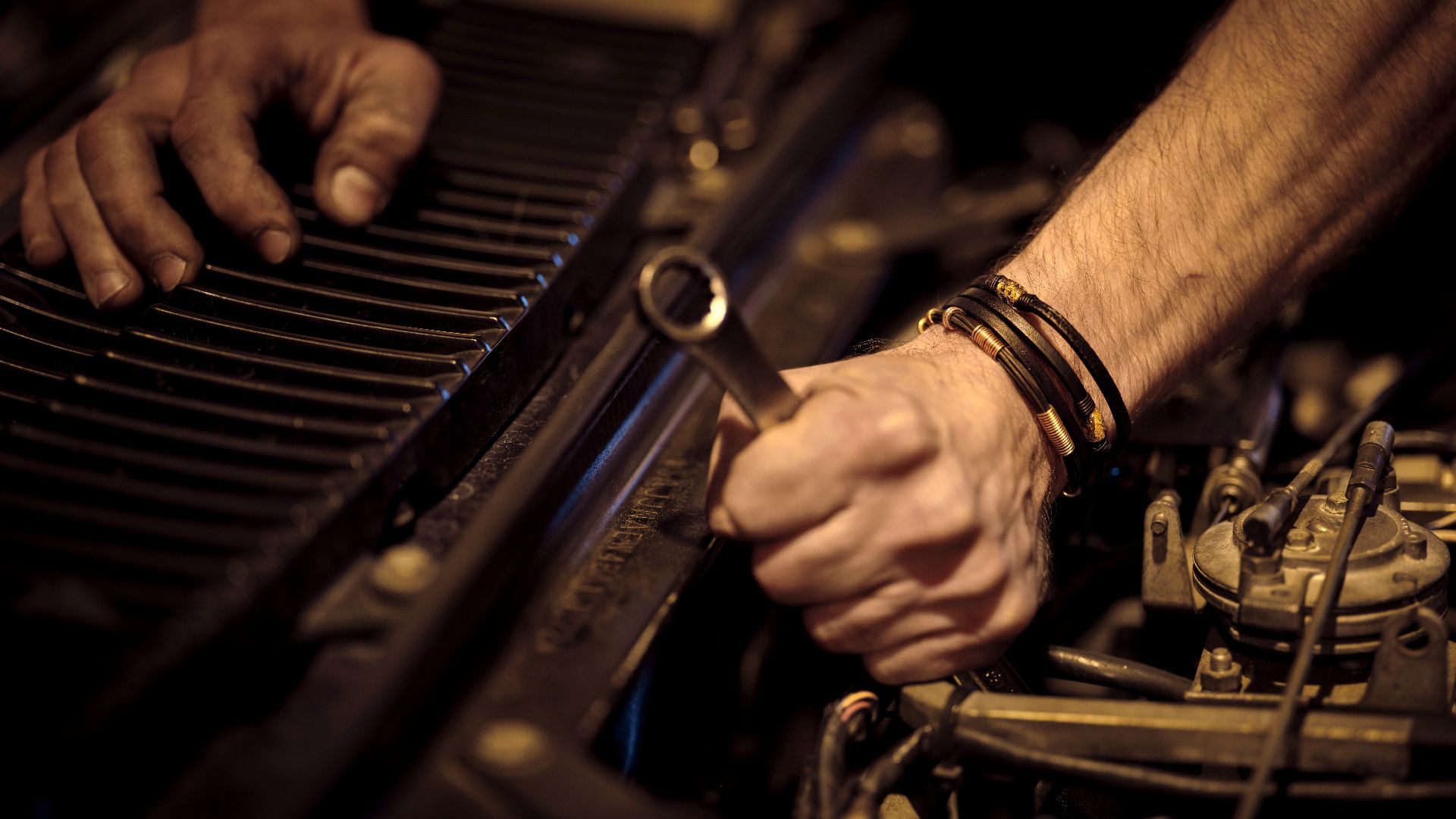 grayscale photo of person playing piano
