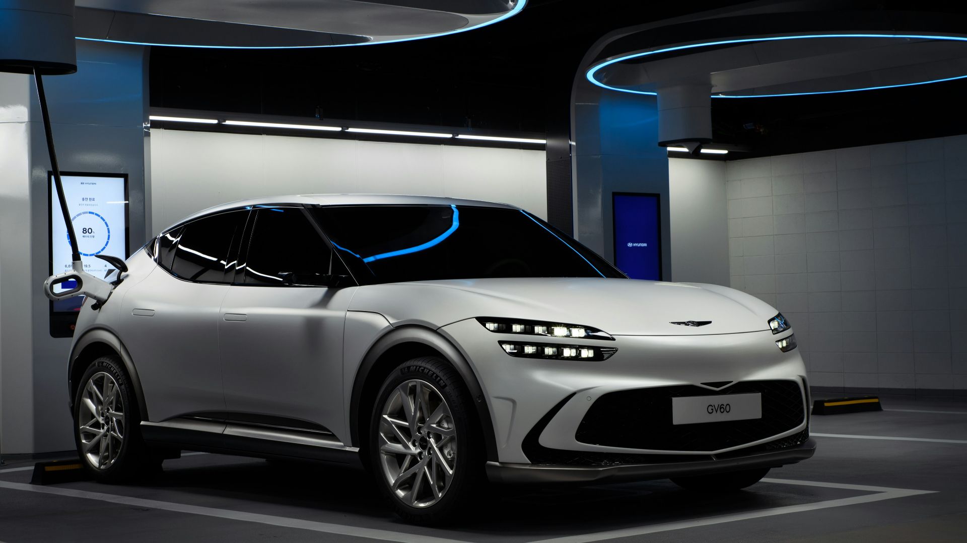 a white sports car in a showroom