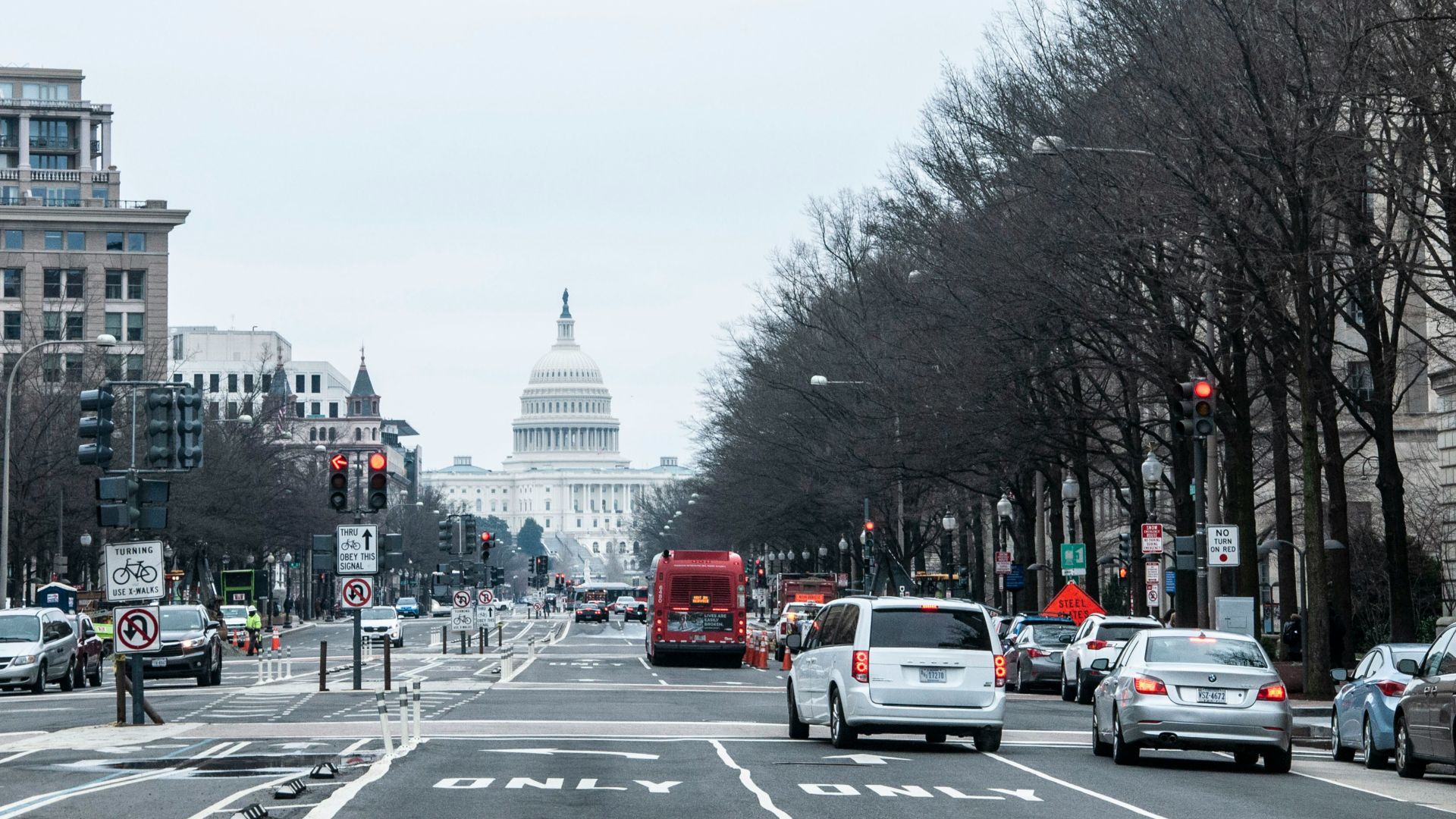 vehicles on road during daytime
