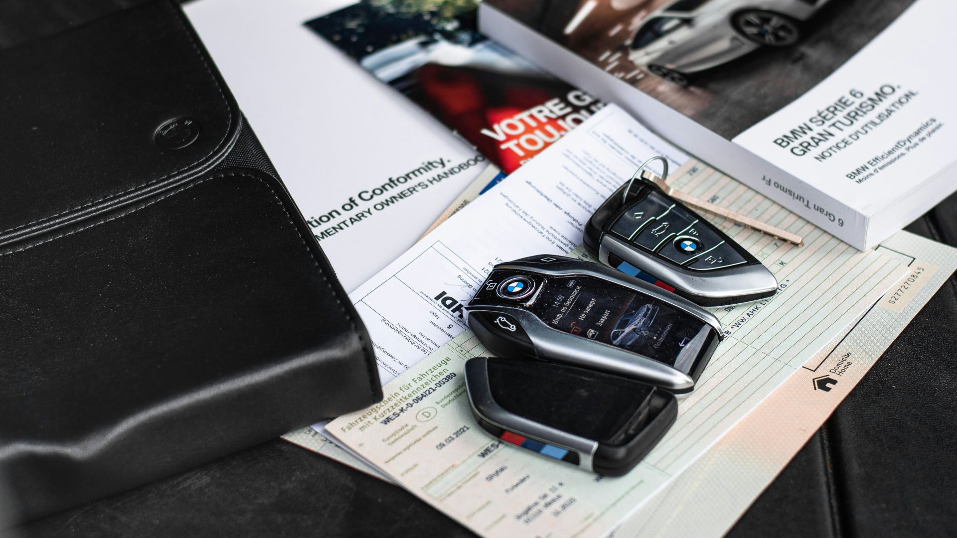 a couple of cell phones on a table