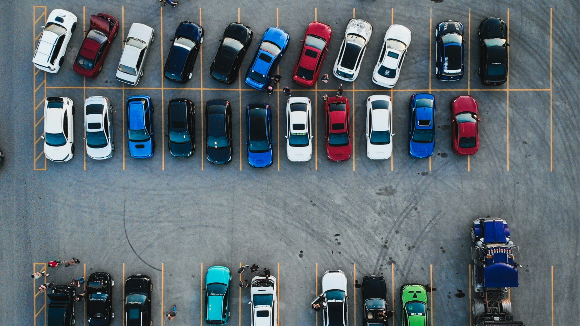 cars parked on parking lot during daytime