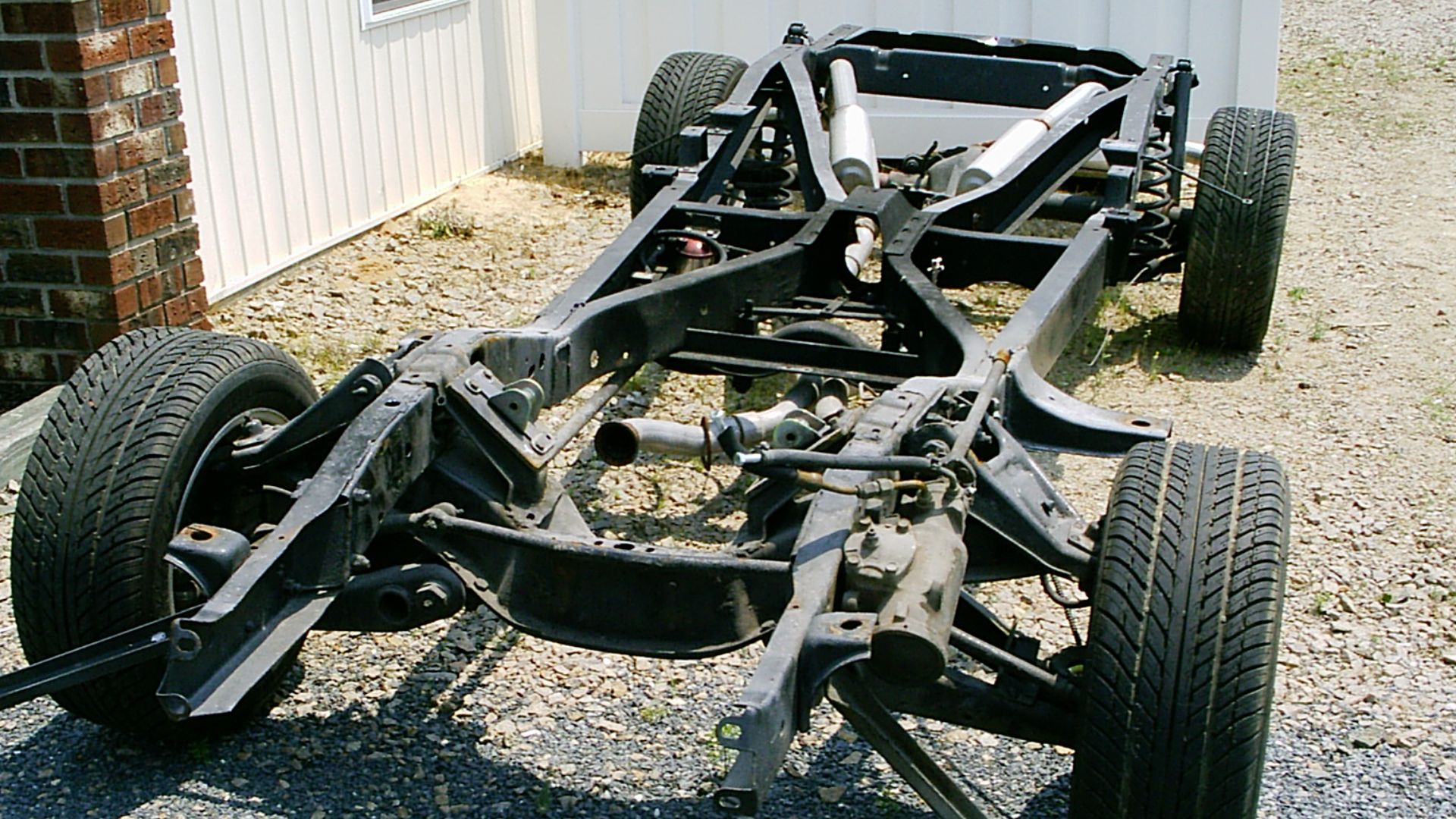 File:Chassis with suspension and exhaust system.jpg