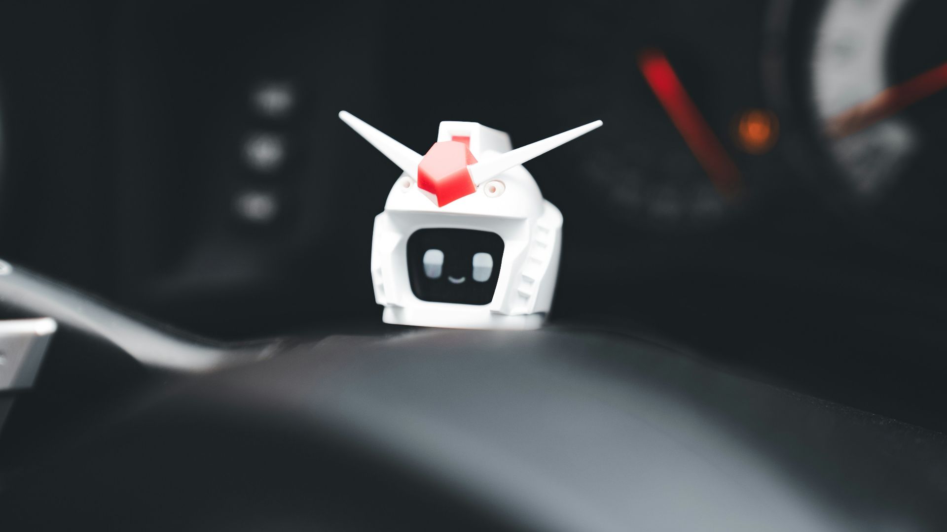 A close up of a car dashboard with a speedometer