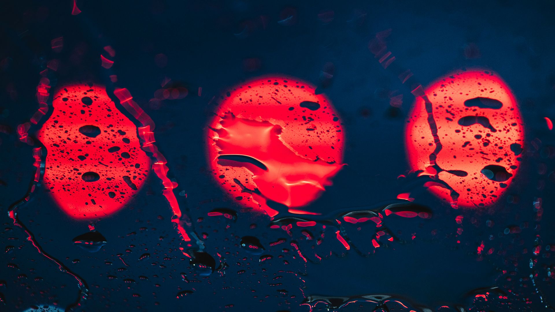 a close up of a rain covered windshield