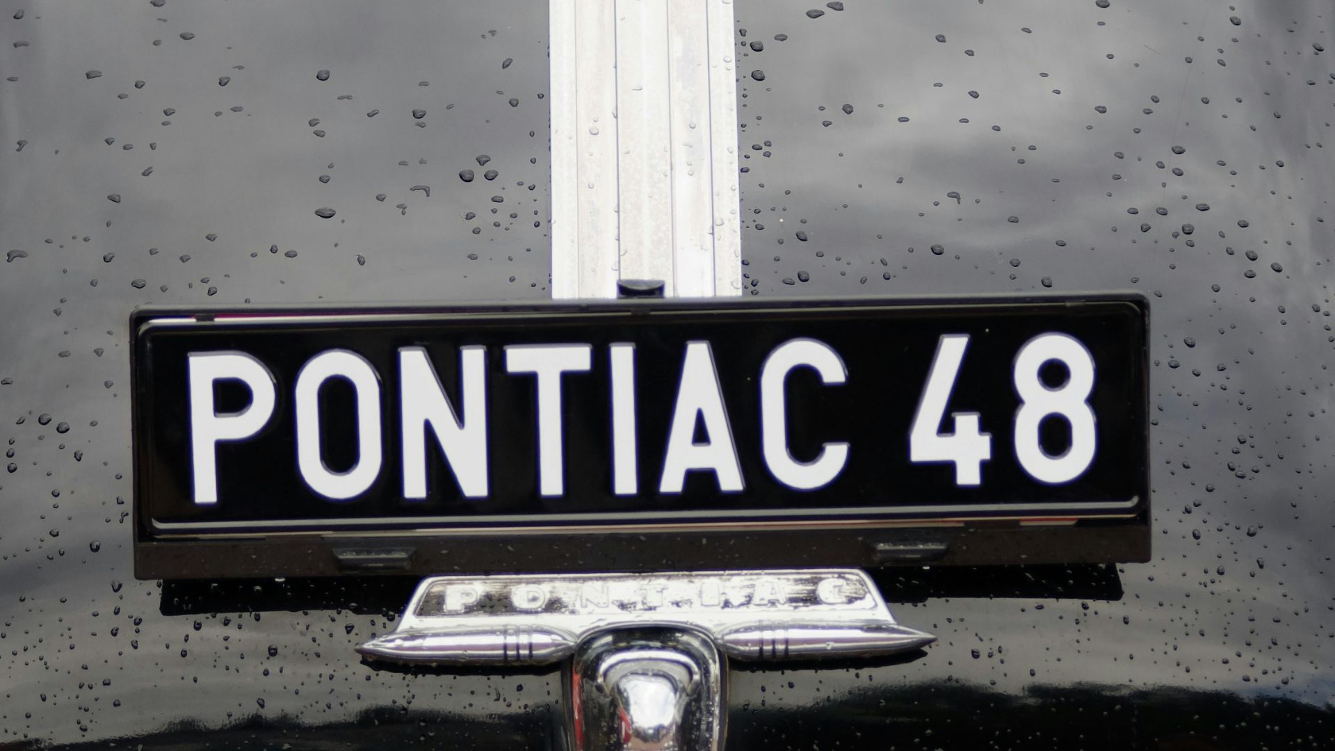 black and white car license plate