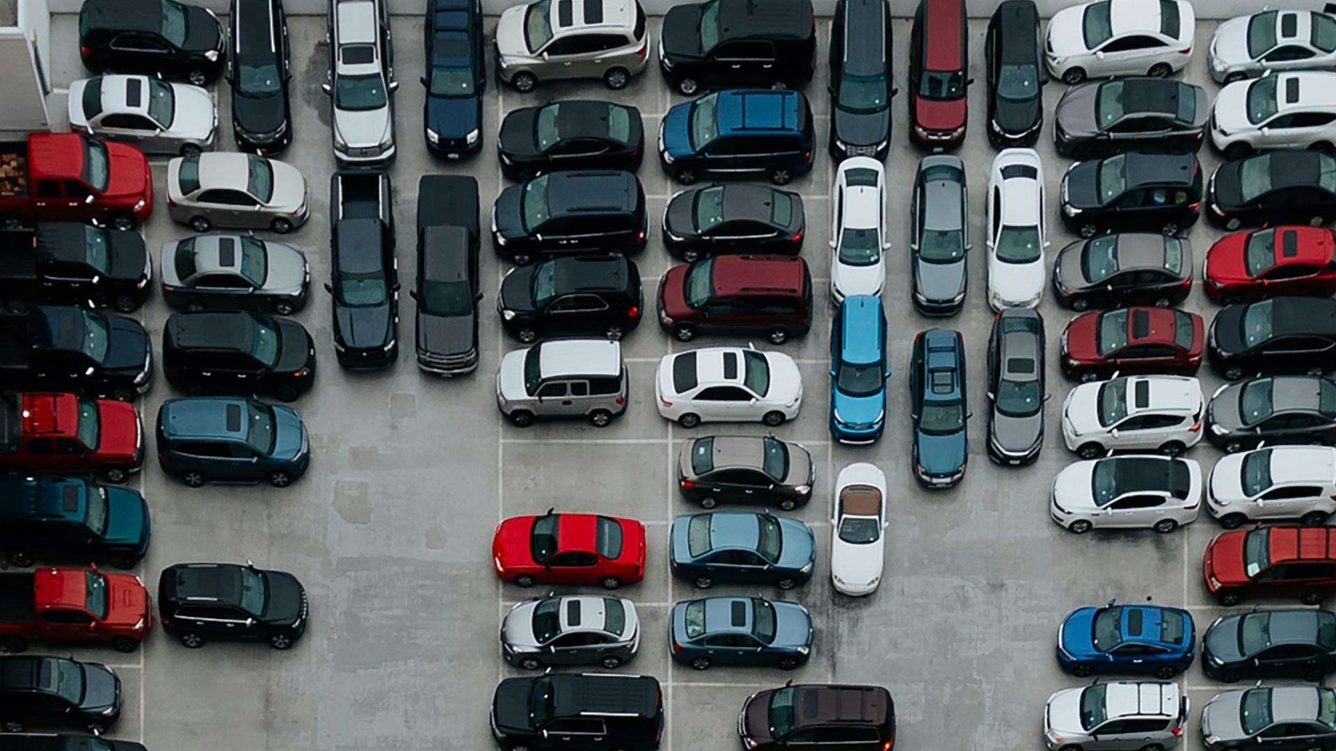 aerial photography of cars on parking lot