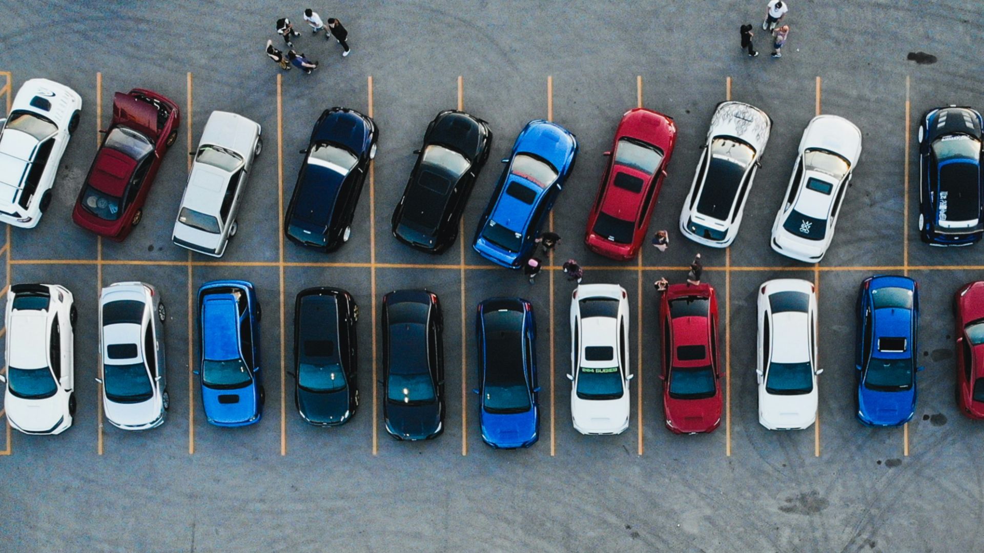 cars parked on parking lot during daytime