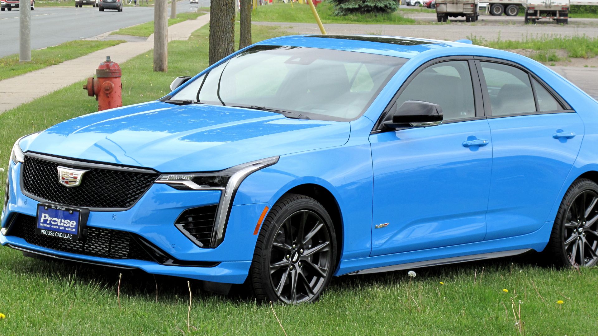 File:2022 Cadillac CT4-V in Electric Blue, Front Left, 06-19-2022.jpg