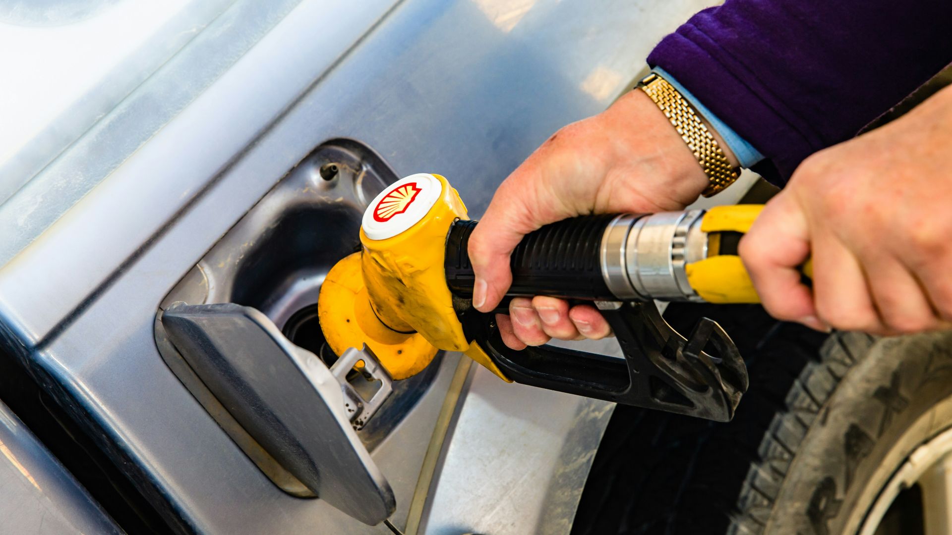 a person holding a drill