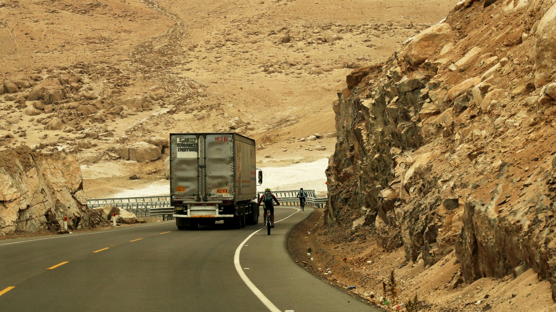 gray box truck at road during daytime